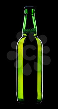 Bottle of lager beer from green glass, isolated on a black background.