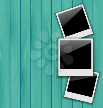 Illustration three blank photo frames on wooden background - vector