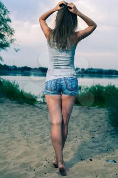 back view of standing woman. beautiful girl.  backside view of person.  Rear view people.
