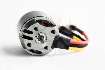 Electric motor of a small  size on white background