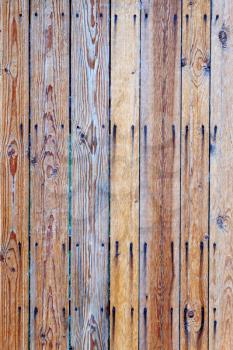 Light-brown old wooden fence. Raster background