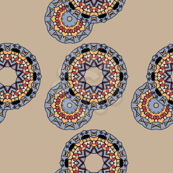 Endless ornate pattern made of indian mandalas over brown background, copyspace in the corner.