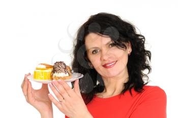 Royalty Free Photo of a Woman Holding a Plate of Food