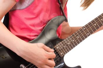 Royalty Free Photo of a Teenager Playing Guitar