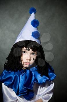 Royalty Free Photo of a Child in a Clown Costume