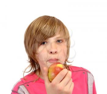 Royalty Free Photo of a Teenager Eating an Apple