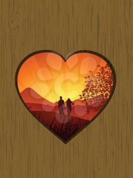 Romantic couple and sunset scene viewed through a heart shaped hole in wood