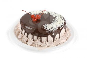 cake closeup with cherry isolated on a white