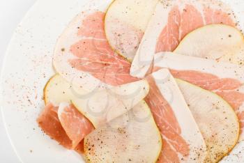 Royalty Free Photo of Sliced Bacon and Pears