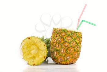 Royalty Free Photo of a Milk Cocktail in a Pineapple