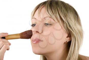 Royalty Free Photo of a Woman Applying Makeup 