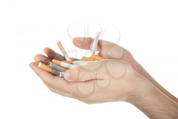 Royalty Free Photo of a Hand Holding Cigarettes
