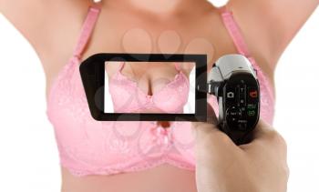 Royalty Free Photo of a Woman in a Bra Being Filmed