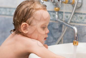 Royalty Free Photo of a Baby in a Bathtub 