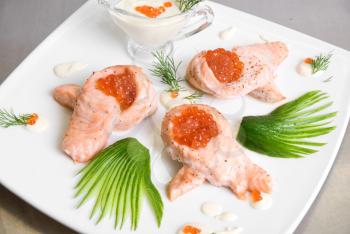 Royalty Free Photo of Roasted Salmon Filets With Red Caviar