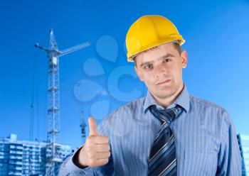 Royalty Free Photo of an Engineer in Front of a Building