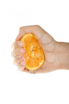 Royalty Free Photo of a Hand Squeezing an Orange