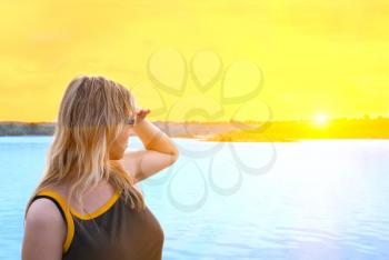 Royalty Free Photo of a Woman at Sunset