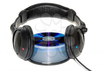 Royalty Free Photo of Headphones on Top of a CD