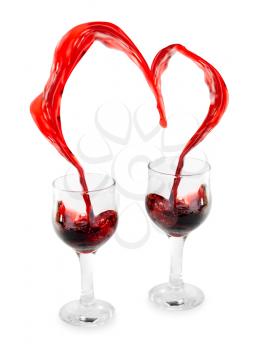 Royalty Free Photo of a Heart From Pouring Red Wine
