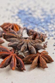 Anise stars close-up on a brown background
