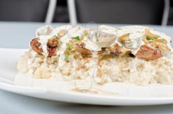 risotto with chicken liver, champignons and sauce