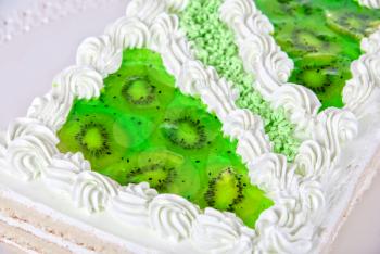 fruit kiwi cake closeup isolated on a white