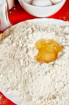 Baking ingredients: eggs, flour, sugar, salt and milk
