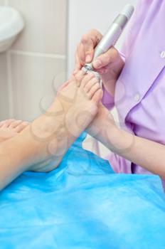 female foot pedicure in a beauty salon