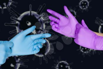 Male and female hand in protective gloves on corona virus COVID-2019 background. Concept of social distance, isolation, quarantine