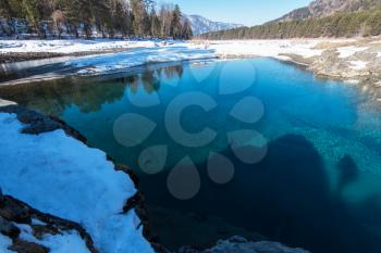 Crystal pure water of blue lake in Altai mountains