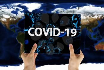 Hand keep sign with 3D illustration of coronavirus on world map background. Elements of this image furnished by NASA