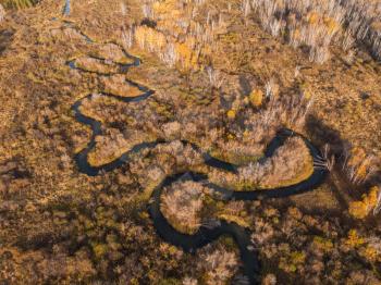 Aerial drone view of autumn landscape with river.