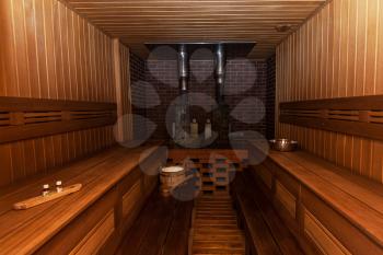 Russian sauna interier with accessories: wooden basins, scoops
