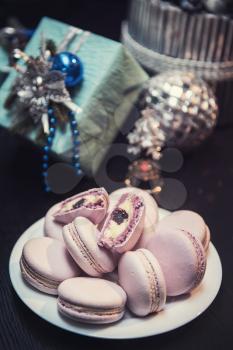 Macaroons cookies on new year background
