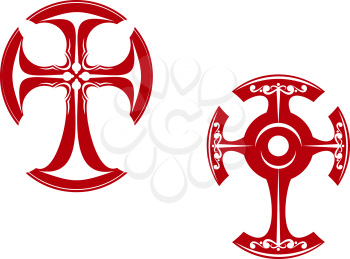 Two stylized crosses with curved ends, one in a Celtic style with floral decoration