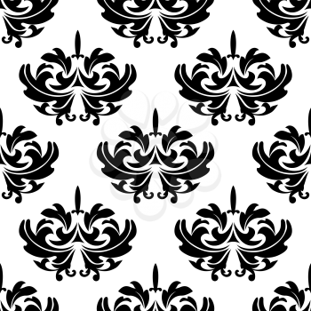 Damask style arabesque pattern with a repeat black and white floral motif in a seamless pattern suitable for fabric, tiles or wallpaper design