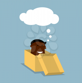 Businessman thinking outside the box concept with african american businessman sitting inside an open cardboard box with his head protruding and a blank thought bubble above
