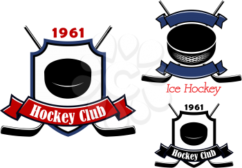 Ice hockey club emblems or badges including hockey pucks, crossed sticks, heraldic shield with date foundation and ribbon banners 