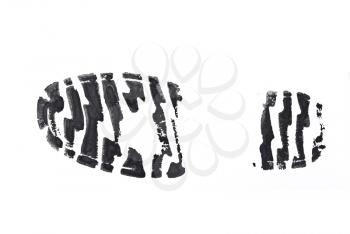 Black print of a trace of a boot 
