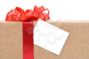 Royalty Free Photo of a Cardboard Box With a Red Bow