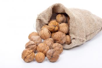 Royalty Free Photo of a Burlap Sack With Walnuts