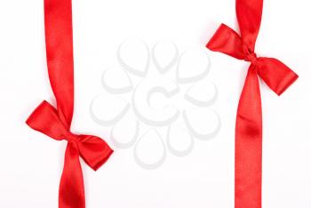 Royalty Free Photo of Red Ribbons With Bows