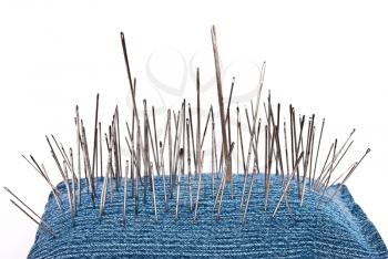 Royalty Free Photo of a Pincushion With Lot of Needles