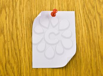 Royalty Free Photo of a Blank Tag on a Wooden Background