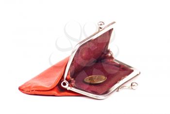 Old red purse against with coins 