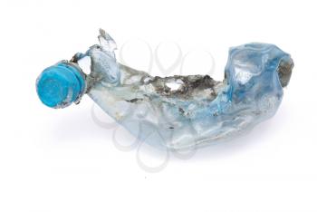 Squashed plastic blue bottle