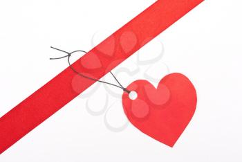 Red gift tag heartand ribbon