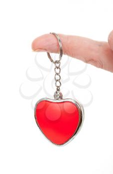 Royalty Free Photo of a Person Holding a Heart Keychain