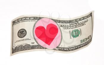 Royalty Free Photo of a 100 Dollar Bill With a Pink Circle in the Center With a Red Heart